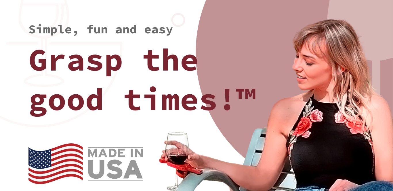 a woman sitting in a chair holding a glass of wine