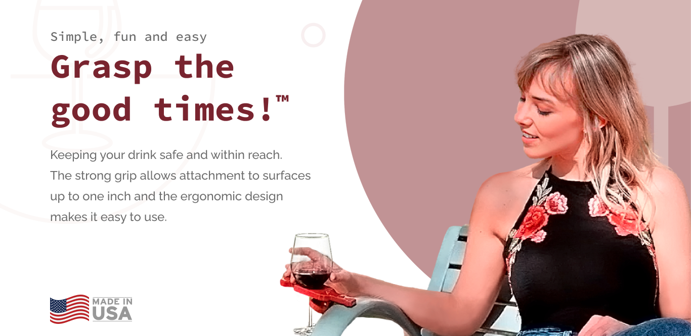 a woman sitting in a chair holding a glass of wine